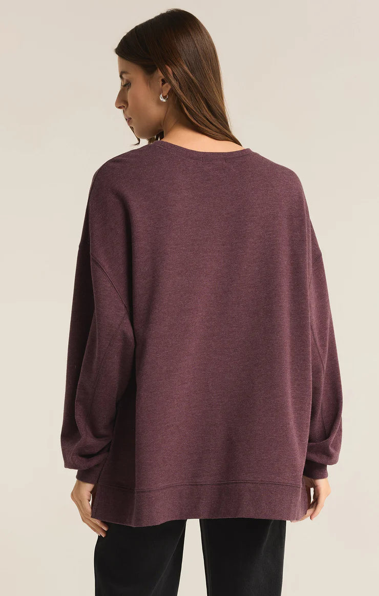 An all Berry Wine modern weekender sweater from the brand Z Supply.