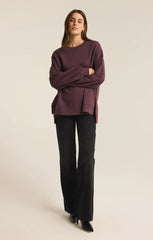 An all Berry Wine modern weekender sweater from the brand Z Supply.