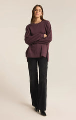 An all Berry Wine modern weekender sweater from the brand Z Supply.