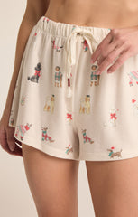 Lounge shorts with a draw string front. The shorts feature dogs dressed in Christmas outfits.