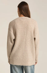 Light Oatmeal Heather color Cardigan for women. The cardigan features 5 front buttons.