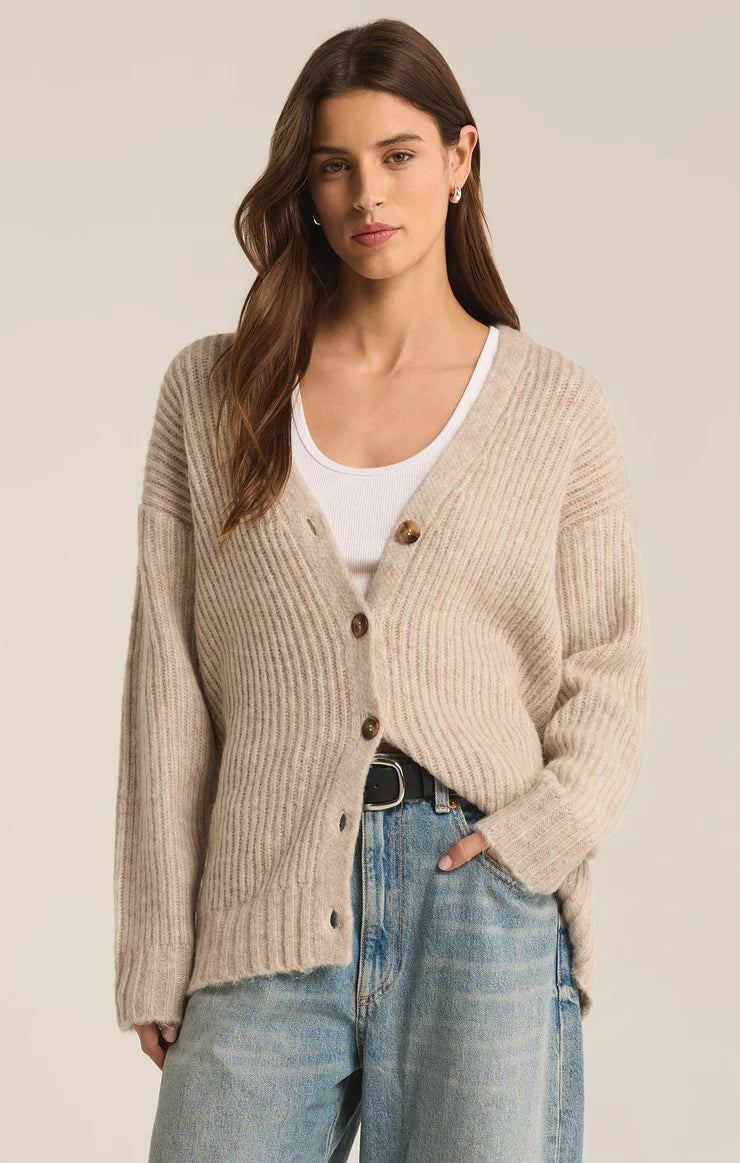 Light Oatmeal Heather color Cardigan for women. The cardigan features 5 front buttons.