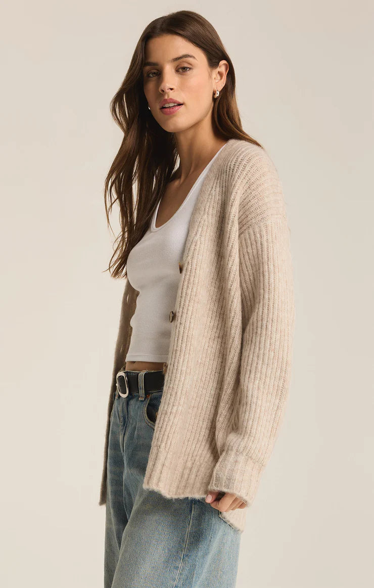 Light Oatmeal Heather color Cardigan for women. The cardigan features 5 front buttons.