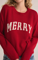 An all red knit sweater featuring the intarsia graphic "Merry." From the brand Z Supply.