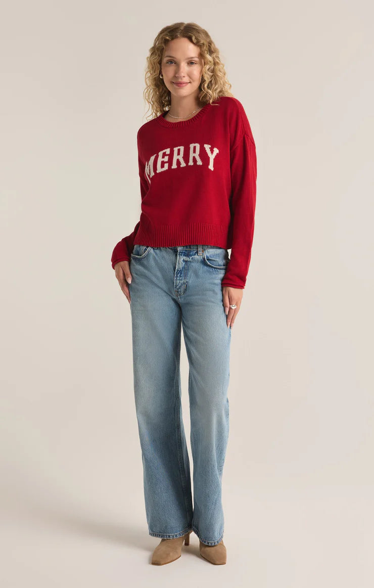 An all red knit sweater featuring the intarsia graphic "Merry." From the brand Z Supply.