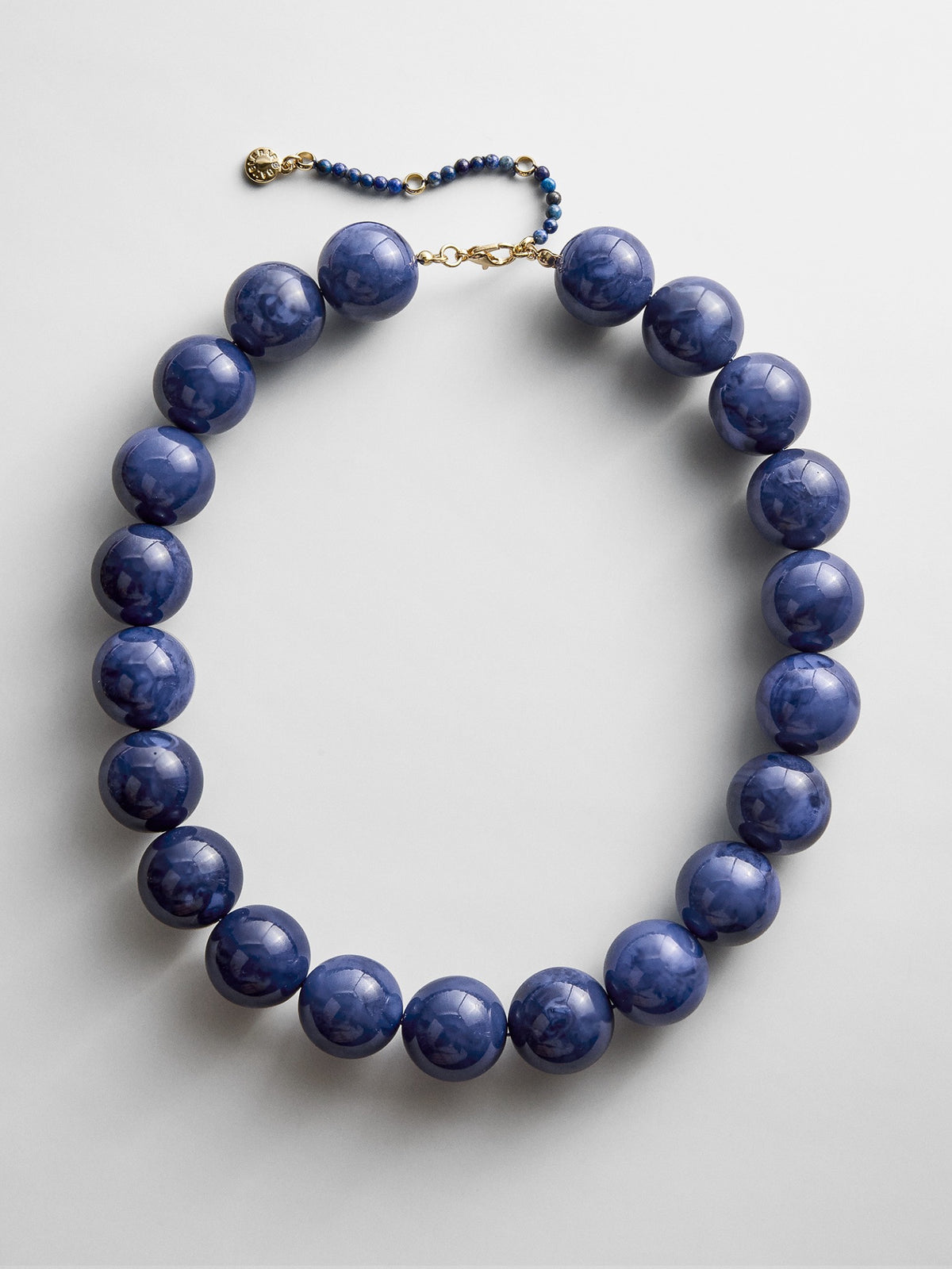 BaubleBar Jane Beaded Necklace in Blue with glossy marbled beads, lobster clasp and beaded extender