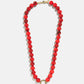 BaubleBar Janette Beaded Ring Necklace in red with glossy beads, a gold-tone collector ring and round crystal charm.