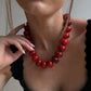 BaubleBar Joan Semi-Precious Necklace in Red worn with a black top