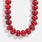 Close-up of red beads on the BaubleBar Joan Semi-Precious Necklace