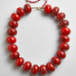 Full view of the BaubleBar Joan Semi-Precious Necklace in Red on a light background