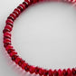 Close-up of the two-tone red beads on the BaubleBar Joyce necklace