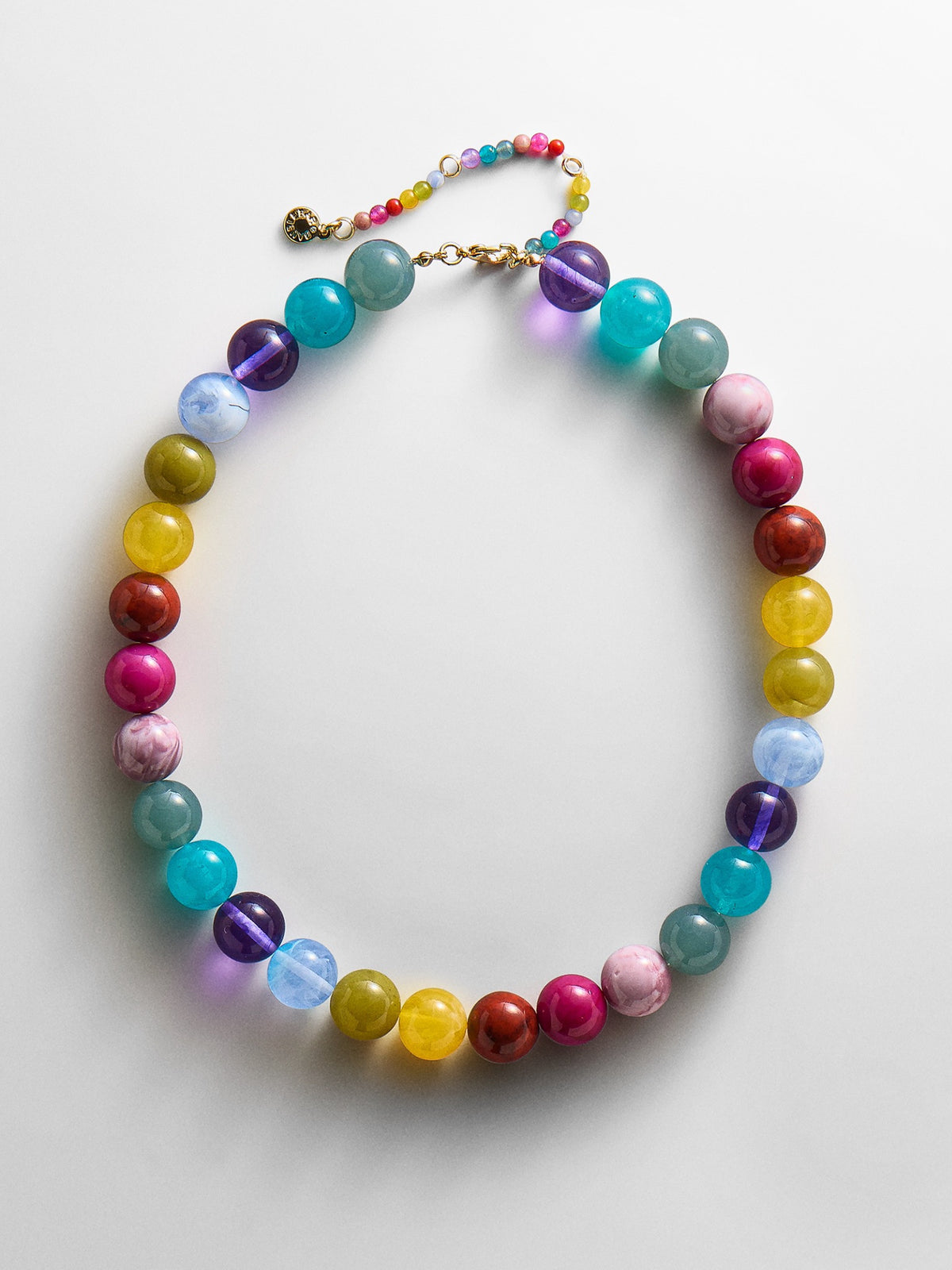 BaubleBar Mini Jane Beaded Necklace in Multi with colorful round beads, a gold-tone lobster clasp and beaded extender.