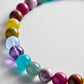 Close-up of the glossy multicolored beads on the BaubleBar Mini Jane Beaded Necklace.