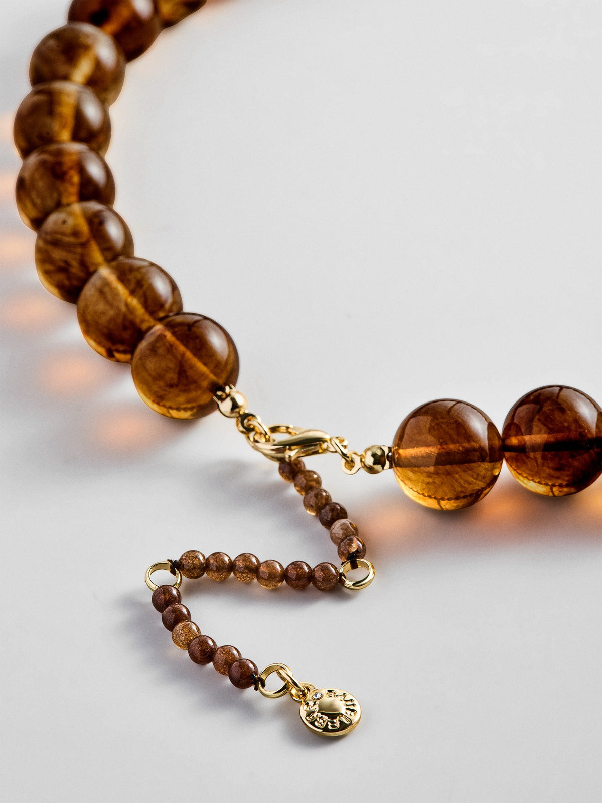 BaubleBar Mini Jane necklace lobster clasp and beaded extender in Tiger's Eye
