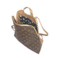 Beaudin Riley bronze backpack open to show the patterned interior