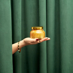 A petite jar scented candle from Capri Blue, the scent is Pumpkin.