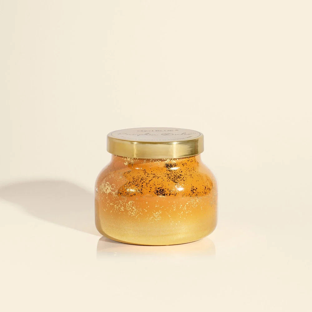 A petite jar scented candle from Capri Blue, the scent is Pumpkin.