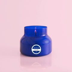 A 19 oz candle from Capri Blue in the scent volcano, from the Capri Blue collection.