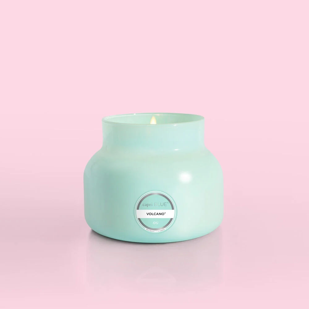 Aqua color Capri Blue candle. The candle is 19 oz.