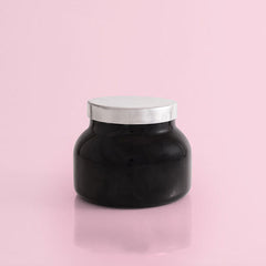 Volcano candle in the color black from the brand Capri Blue. The candle is 19 oz.