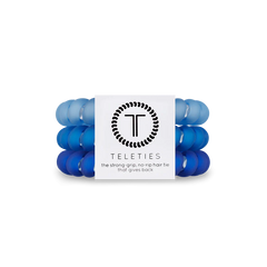 A pack of 3 large size hair ties in the color blue. Designed by TELETIES.