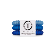 A pack of 3 small sized hair ties in the color blue. From TELETIES.