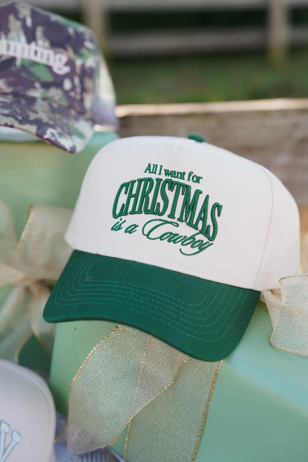 All I Want for Christmas Is a Cowboy Trucker Hat, cream front and green bill