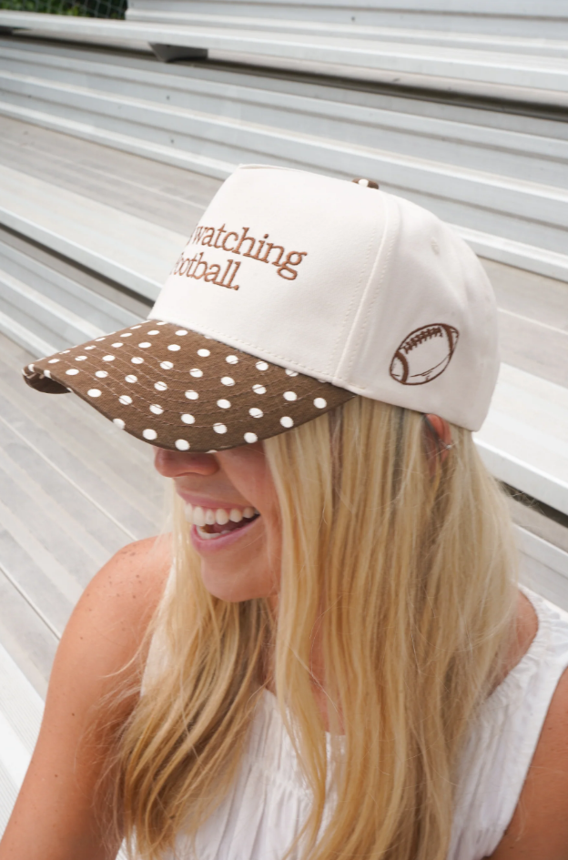 He's Watching Football Trucker Hat