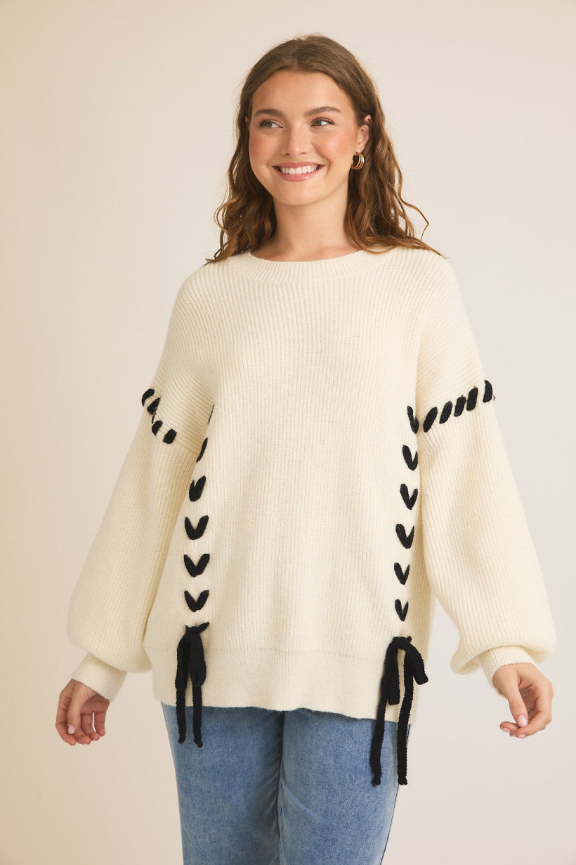 Isabella Bow Tie Lace Up Sweater.