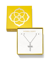 Crystal silver cross necklace presented in a signature Kendra Scott gold gift box.