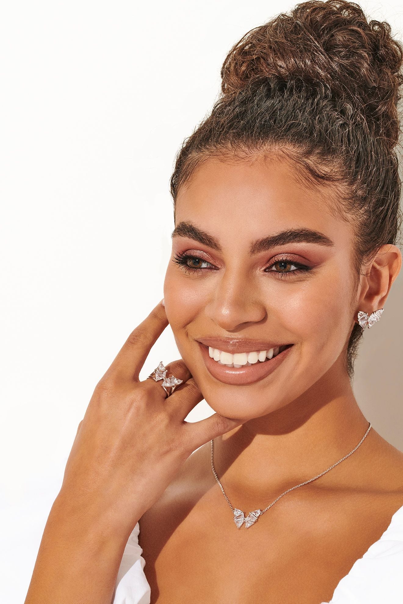 Kendra Scott model with Blair butterfly collection earrings, necklace and ring