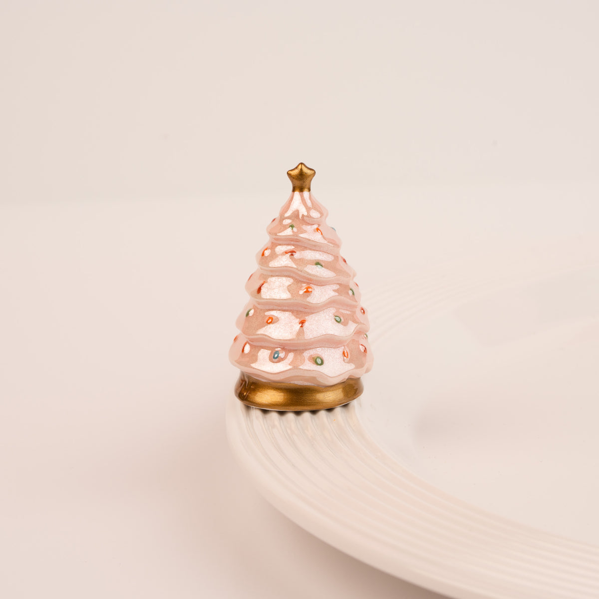 Nora Fleming Twinkle Tree mini displayed on a serving base (Twinkle Tree)