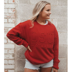 Women's crewneck sweater in all red that reads, "OSU BUCKEYES." The wording is also in red.