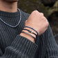 Pig & Hen navarch 4mm closed navy silver bracelet styled on wrist (Navy | Silver)