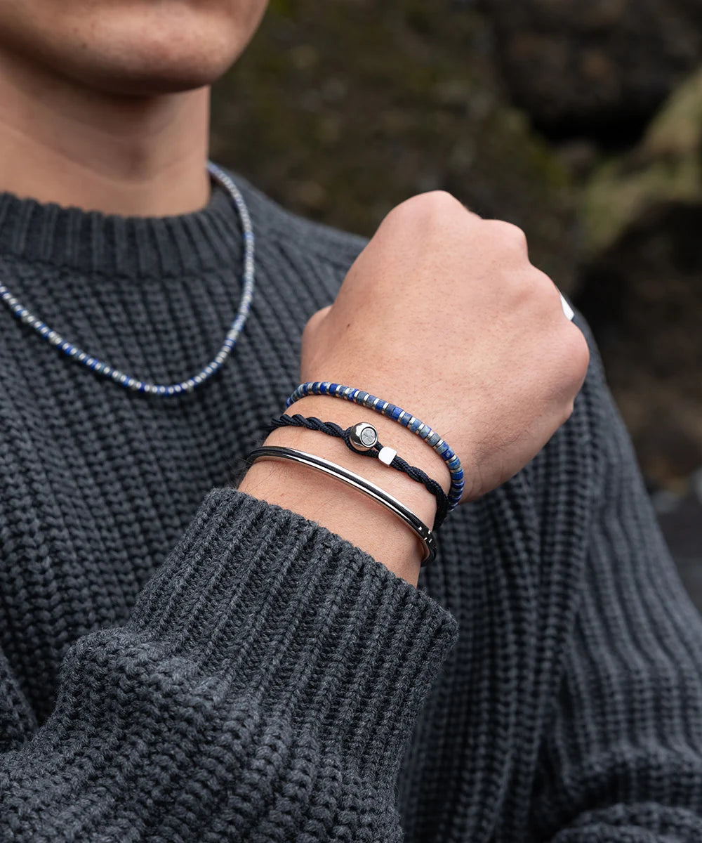 Pig & Hen navarch 4mm closed navy silver bracelet styled on wrist (Navy | Silver)