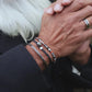 Pig & Hen navarch 4mm closed navy silver bracelet styled on wrist (Navy | Silver)