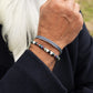 Pig & Hen navarch 9mm striato silver bracelet styled on wrist (Striato | Silver)