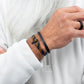 Pig & Hen vicious vik black rust orange black bracelet styled on wrist (Black - Rust Orange | Black)
