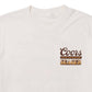 Seager x Coors Brush Truck Tee in Vintage White — chest print detail