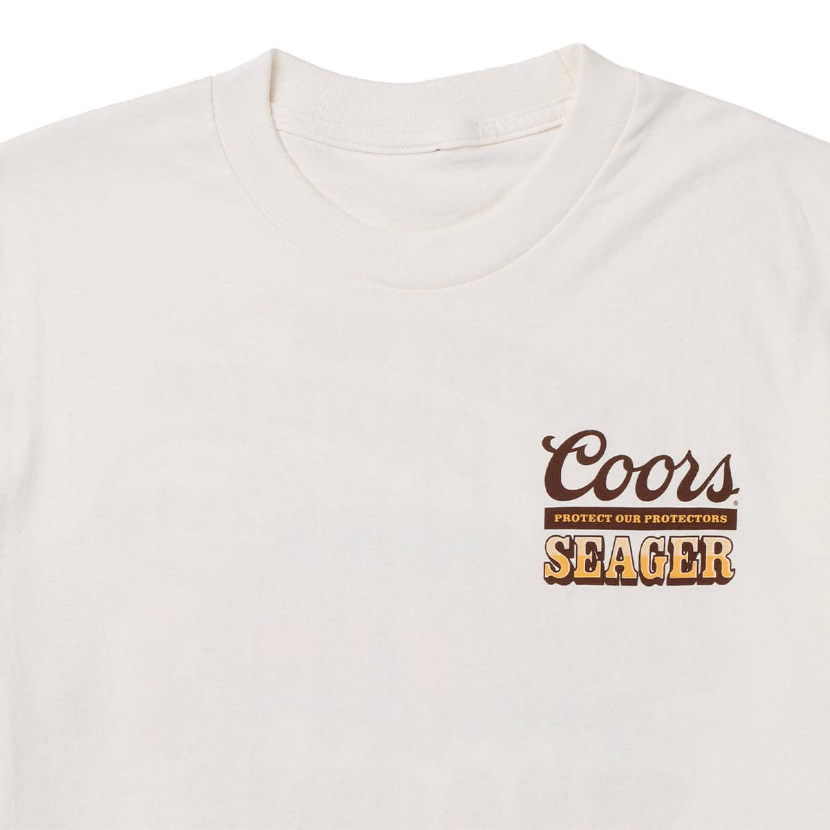 Seager x Coors Brush Truck Tee in Vintage White — chest print detail