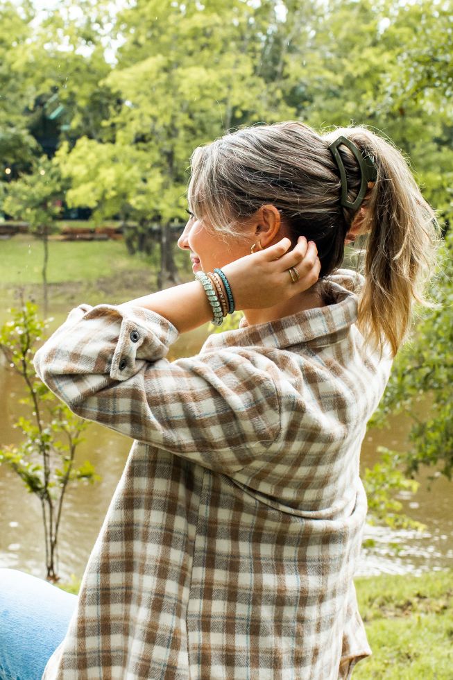 An Open Olive Medium Hair Clip from TELETIES.
