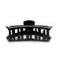 An open jet black hair clip claw from TELETIES.