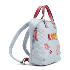 Vera Bradley Mini Totepack Pride Bright Stripe, side view of the bag. Showing a colorful zipper.