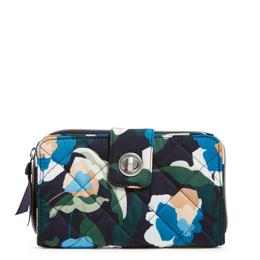 An RFID Turnlock Wallet from Vera Bradley. In their new Immersed Blooms performance twill fabric. 1230