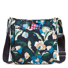 A Triple Zip Hipster Bag in Immersed Blooms pattern.