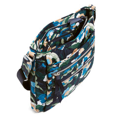 A Triple Zip Hipster Bag in Immersed Blooms pattern.