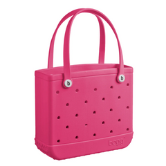 A pink colored baby bogg bag tote.