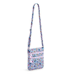 Vera Bradley Triple Zip Hipster Bag In Cloud Vine Multi Pattern with the crossbody strap fully extended.