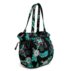 Vera Bradley Glenna Satchel Bag In Island Garden Pattern, showing on the right side of the handbag, with the shoulder straps raised.