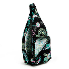 Vera Bradley Sling Backpack In Island Garden Pattern, with both the front and main pockets unzipped.
